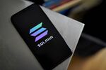 The Solana logo on a smartphone arranged in the Brooklyn Borough of New York, U.S., on Saturday, July 31, 2021.