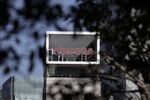 Signage for Toshiba Corp. is displayed at the company's headquarters in Tokyo, Japan.