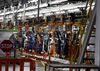 Vehicles move along the production line at the General Motors Co. Orion Assembly Plant in Orion Township, Michigan.