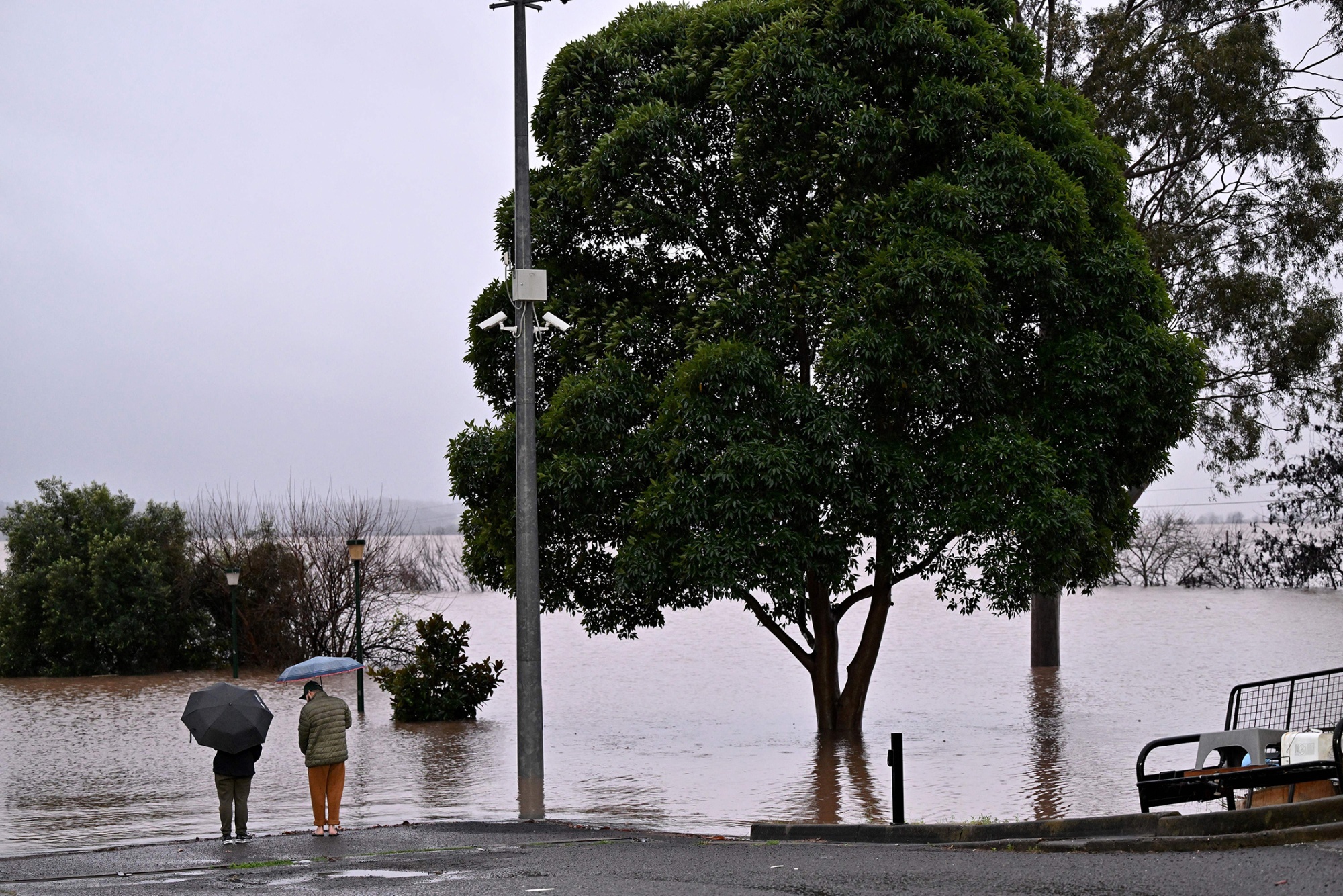 Rising floodwaters near a residential area in the Windsor suburb of Sydney on July 4.