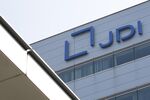 The Japan Display Inc. logo is displayed atop the company's plant in Mobara, Chiba Prefecture, Japan.