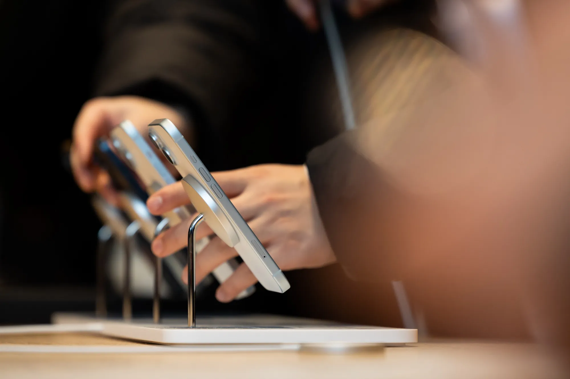 Apple Inc. iPhone smartphones on display.