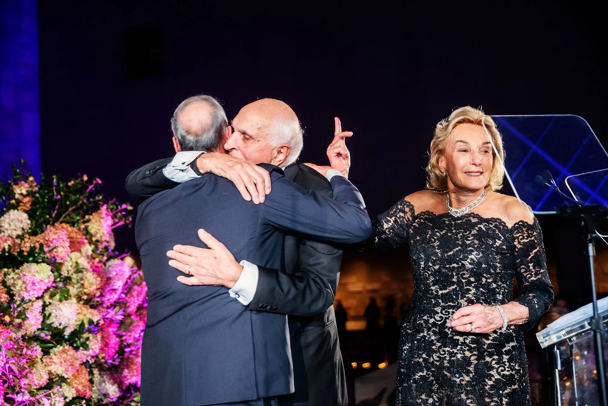 Ken Langone hugs Robert Grossman, CEO of NYU Langone Health