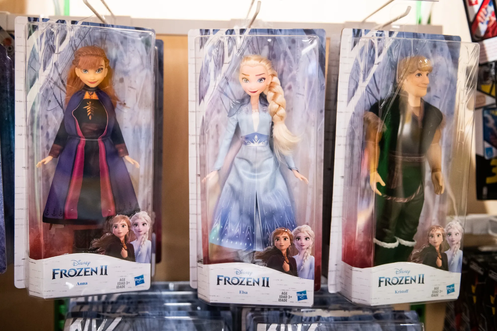 Walt Disney Co. Frozen II dolls hang on display at a&nbsp;store in Paramus, New Jersey.