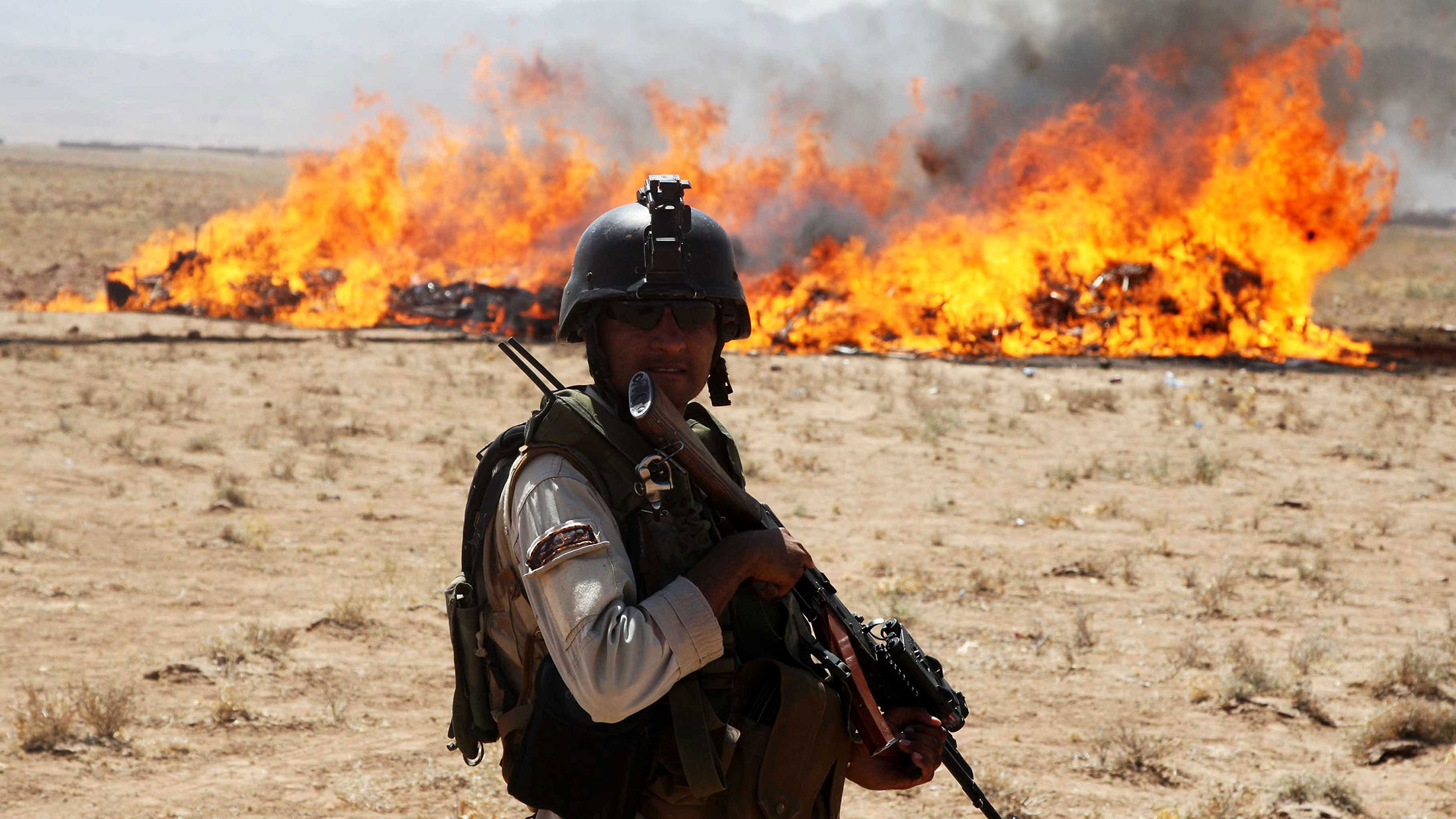 Afghani security forces burn 21 tons of the narcotic drug in Herat, Afghanistan.
