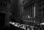 Pedestrians walk past the New York Stock Exchange&nbsp;in New York, U.S.