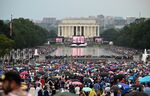 Crowds are massed around the Reflecting Pool as US President Donald Trump speaks.