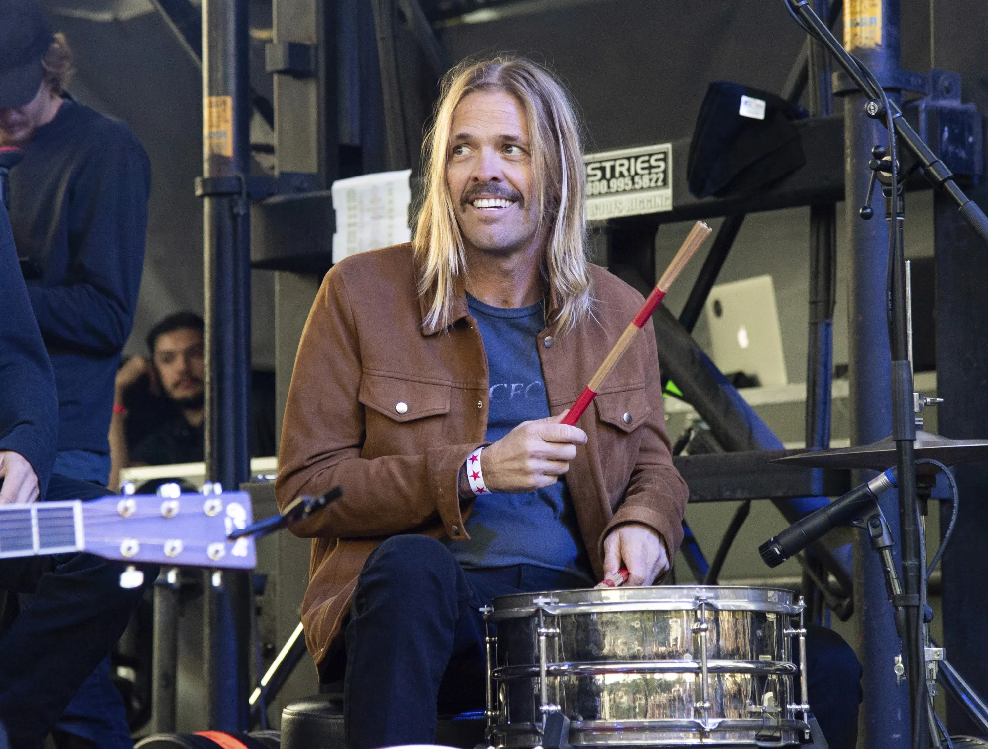 Musician Taylor Hawkins appears at One Love Malibu in Calabasas, Calif., on Dec. 2, 2018. Foo Fighters will honor the rock band’s late drummer Taylor Hawkins with a pair of tribute concerts in September — one in London and the other in Los Angeles. The twin shows will take place Sept. 3 at London’s Wembley Stadium and Sept. 27 at The Kia Forum in Los Angeles. Hawkins died March 25, 2022, during a South American tour with the rock band. He was 50. (Photo by Amy Harris/Invision/AP, File)