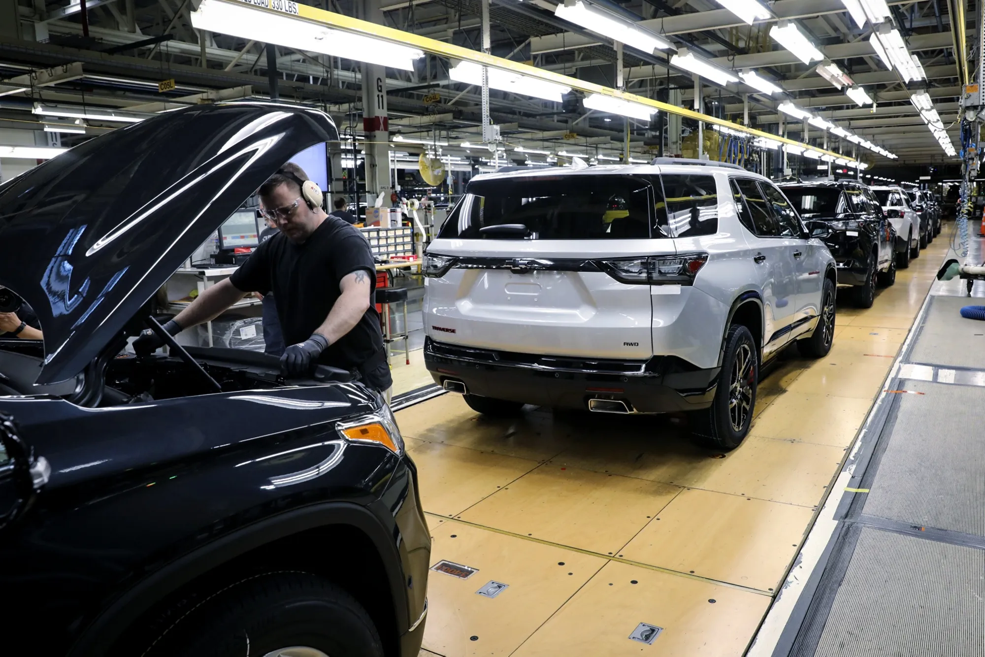 General Motors vehicles&nbsp;on an assembly line in Lansing, Michigan.