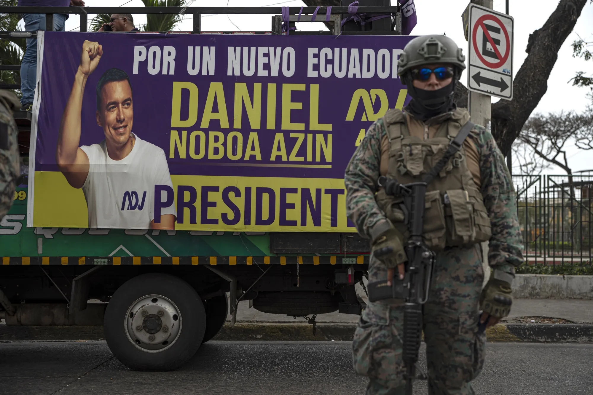 A military officer stands guard during a campaign rally for Daniel Noboa in Guayaquil, Ecuador last October.