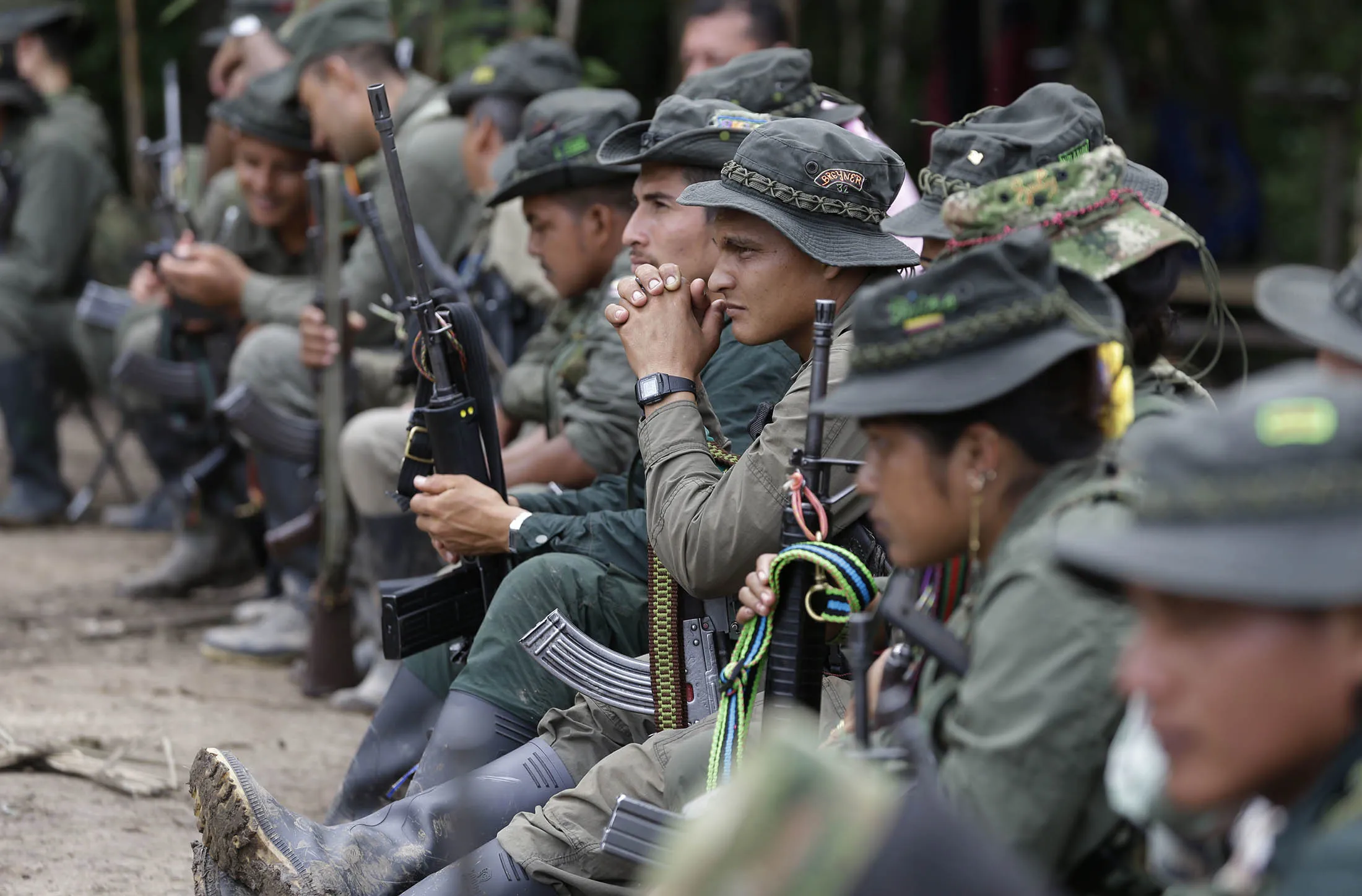 Rebels soldiers of the 32nd Front of the Revolutionary Armed Forces of Colombia, or FARC, take a break at their camp in the southern jungles of Putumayo, Colombia.
