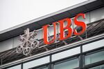 A UBS Group AG logo outside offices in the Altstetten district of Zurich, Switzerland, on Monday, June 2, 2025. Switzerland's growth spurt into 2025 was even more pronounced than initially estimated, with the economy expanding at the fastest pace in two years.