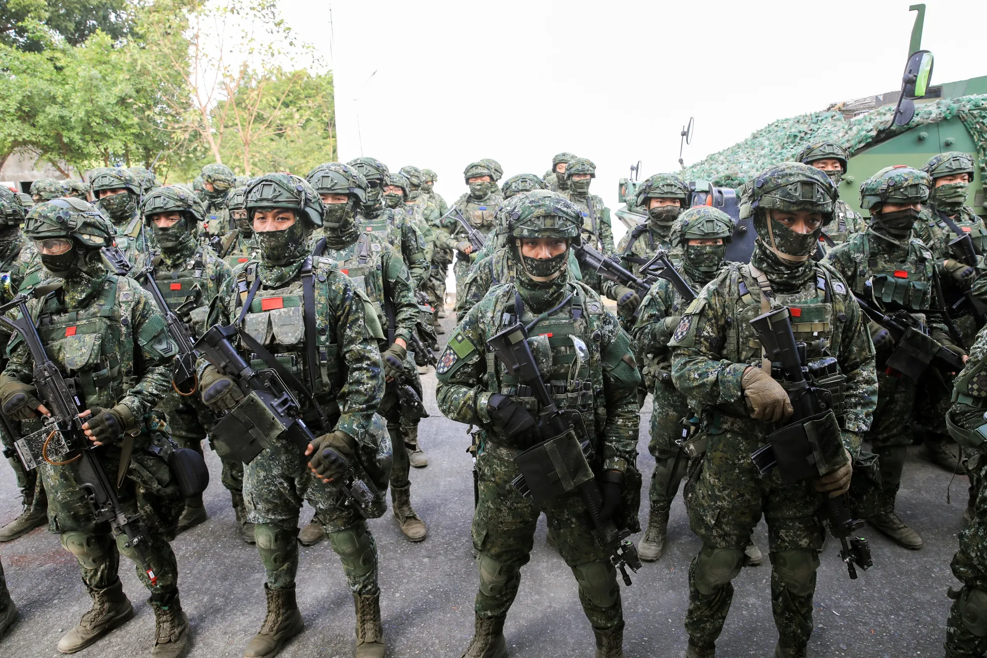 Taiwanese soldiers participate in a military exercise simulating an invasion by China in Kaohsiung on Jan. 6. Taiwan is bracing for more Chinese military patrols this year&nbsp;after People’s Liberation Army incursions more than doubled in 2021.