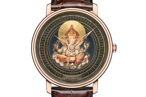 The design on the dial is achieved entirely through engraving.