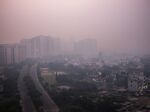 Buildings are shrouded in smog in Noida, Uttar Pradesh, earlier in November 2021.