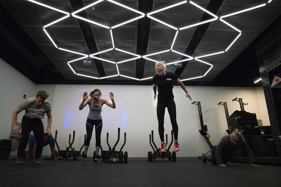 Group exercise at BKBX in Boston, an &quot;adventure training center&quot; where members can have their biometrics tracked by wearable technology and analyzed by staff.