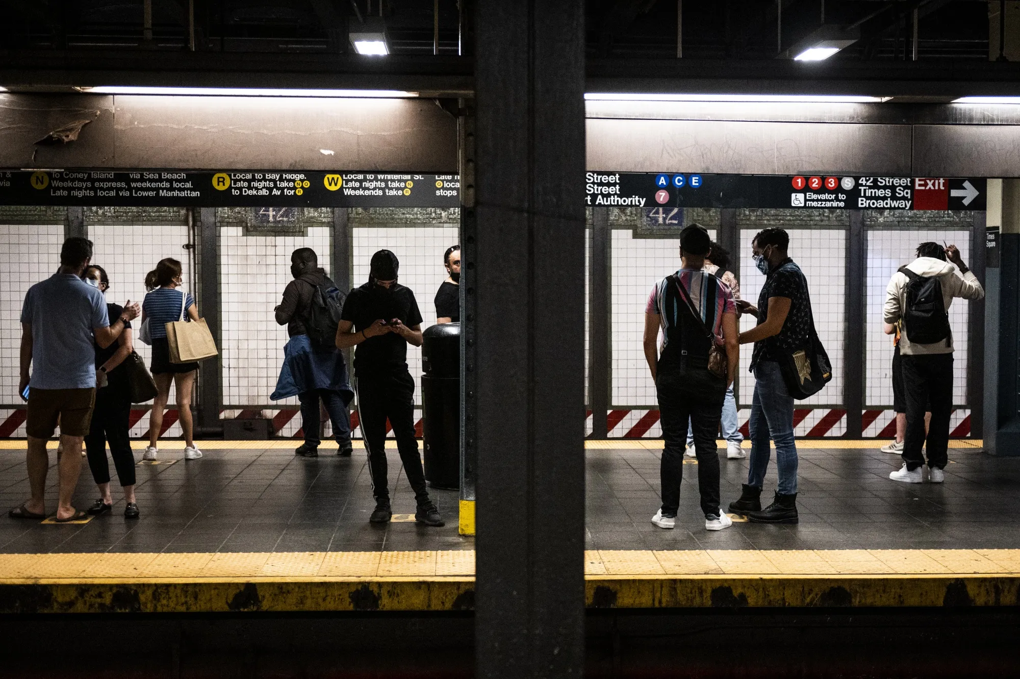 Commuters on a platform at the 42nd Street subway station in New York.