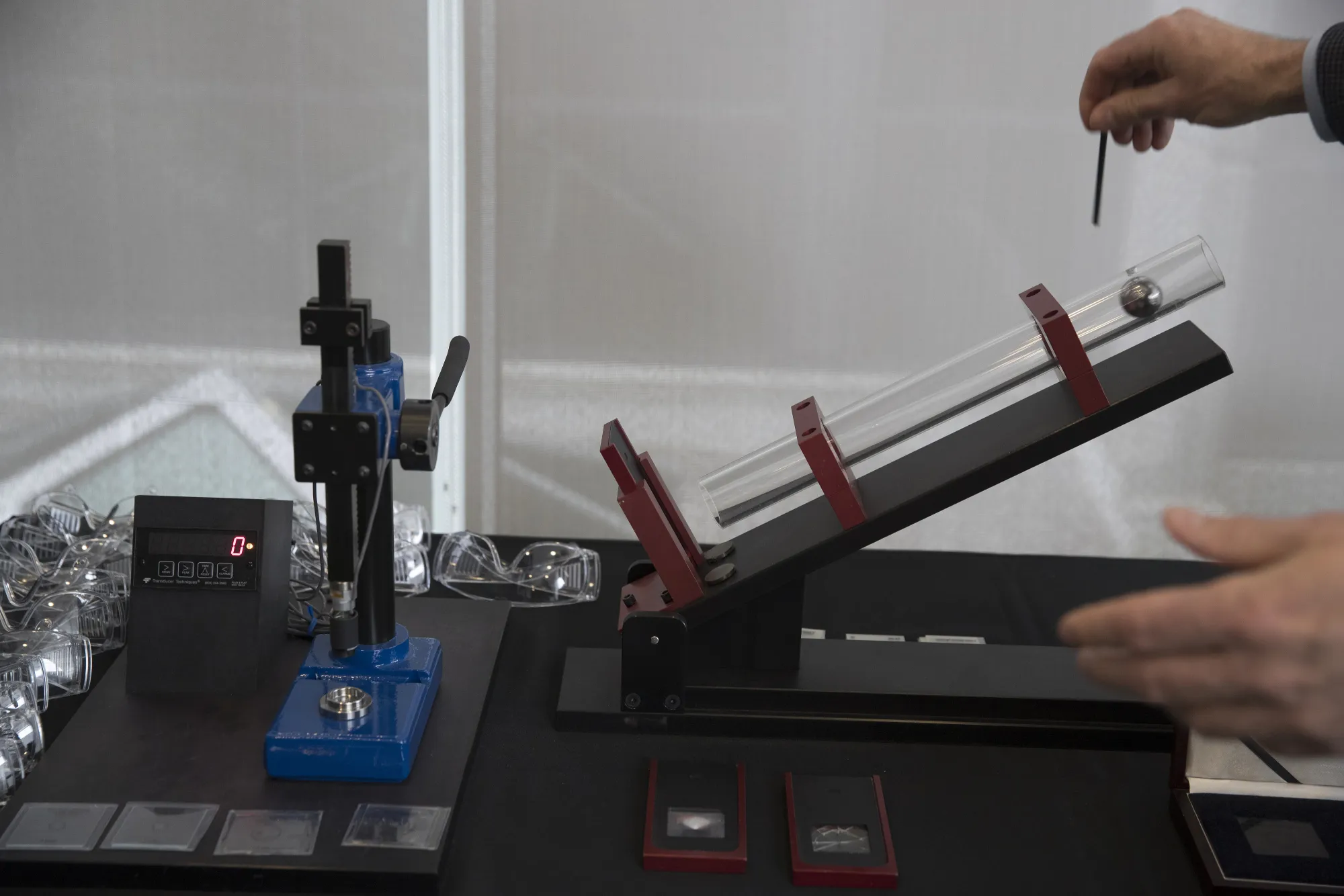 An employee demonstrates a durability test for Gorilla Glass at a Corning Inc. facility&nbsp;in Corning, New York.