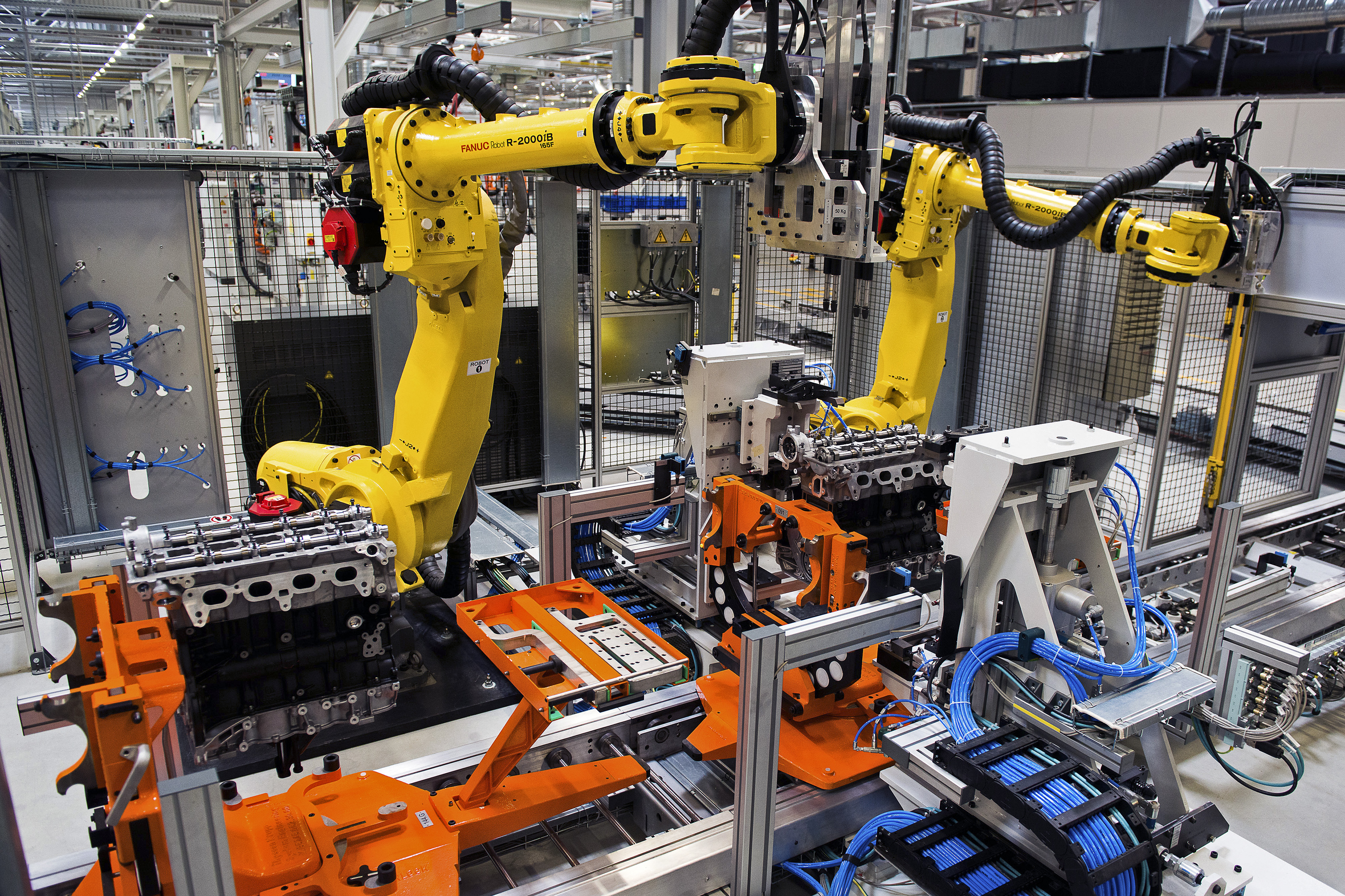 Новое оборудование для процесса. Роботы фирмы Fanuc. Роботизированный Технологический комплекс РТК. Fanuc производители роботов. Автоматизация производства.