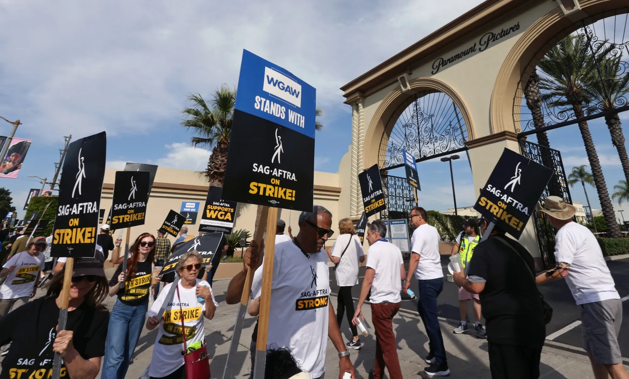 Protesters join the picket line outside Paramount Studios on Sept. 27.