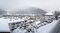 Mist covers the mountain as snow sits on commercial and residential property below in Davos, Switzerland, on Tuesday, Jan. 12, 2015.