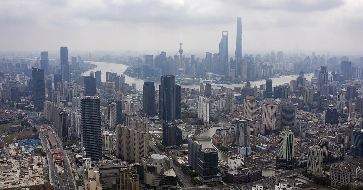 Vehicles travel along near-empty roads during a Covid lockdown in Shanghai on May 24.