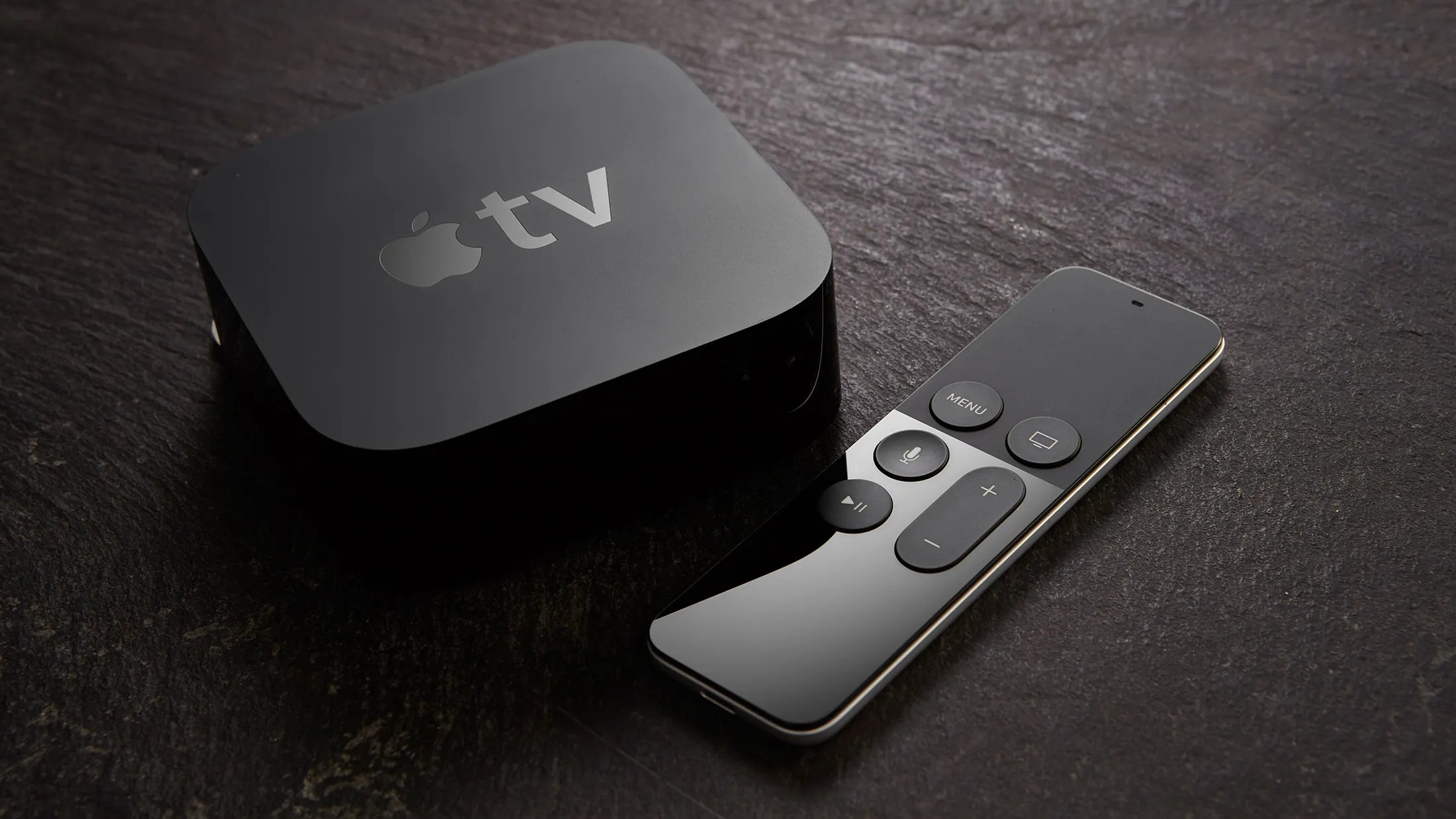 An Apple TV device and Siri remote control, taken on November 19, 2015.
