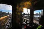 An MBTA train operator rides over the Longfellow Bridge between Cambridge and Boston, Mass.&nbsp;