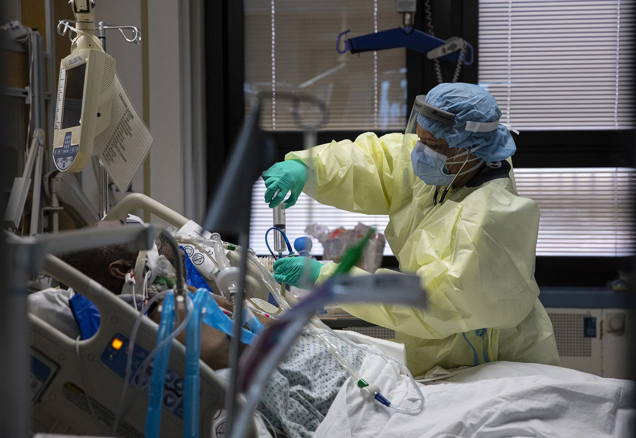 A nurse treats a Covid-19 patient at a hospital in New York on April 24.