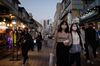 Pedestrians wearing face masks in Seoul Nov. 16.