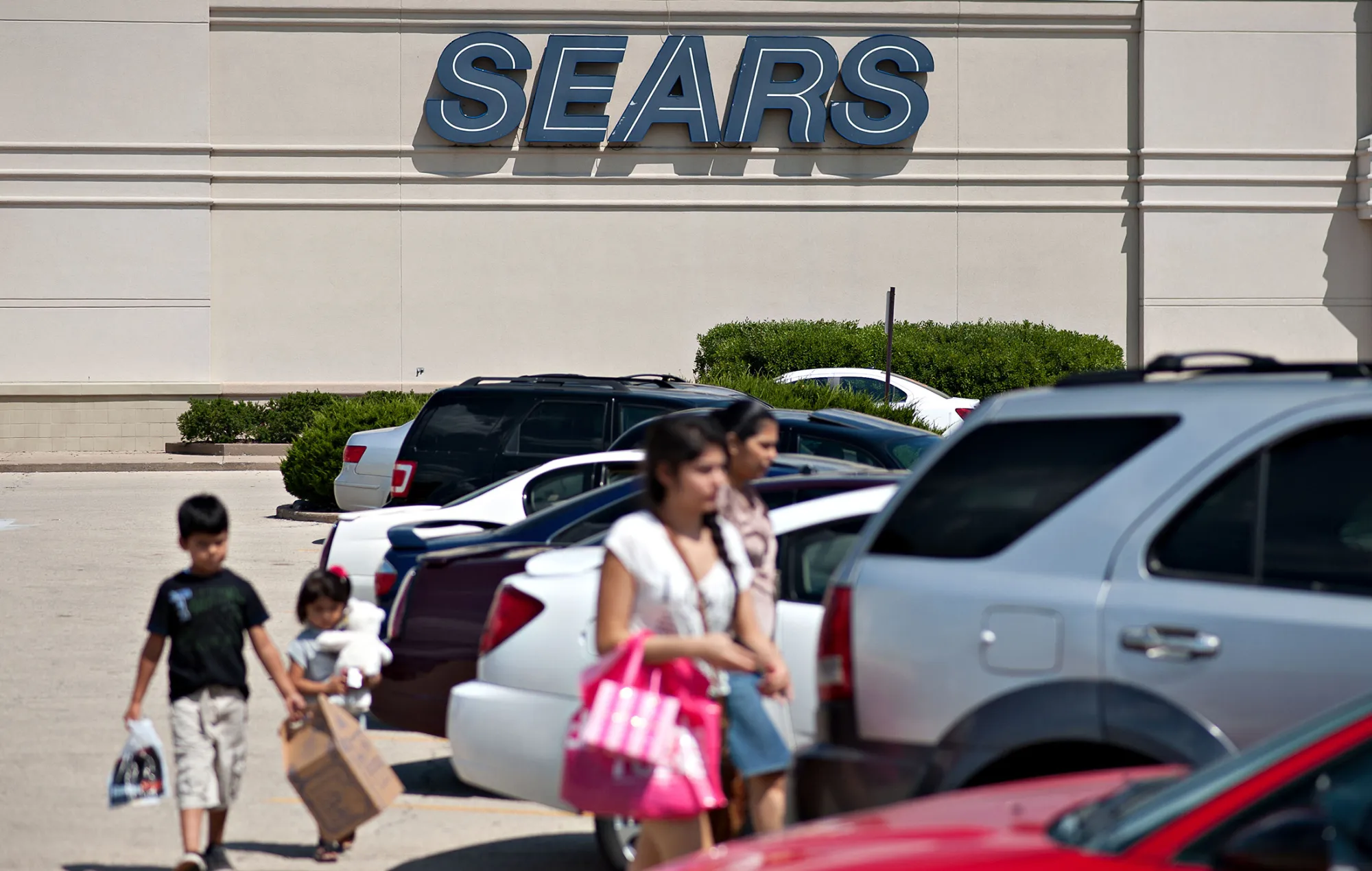 Shoppers exit a Sears store in Peoria, Illinois.