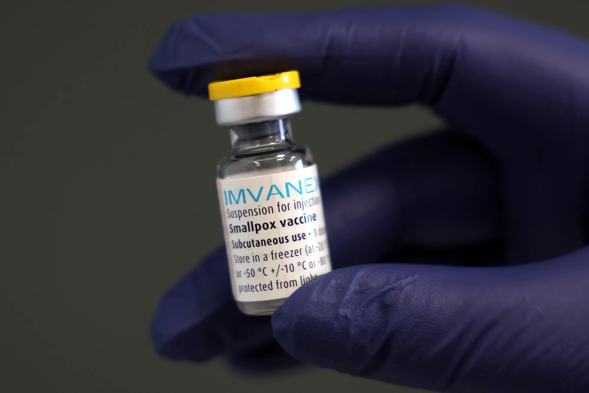 A medical professional prepares a dose of the monkeypox vaccine in London.