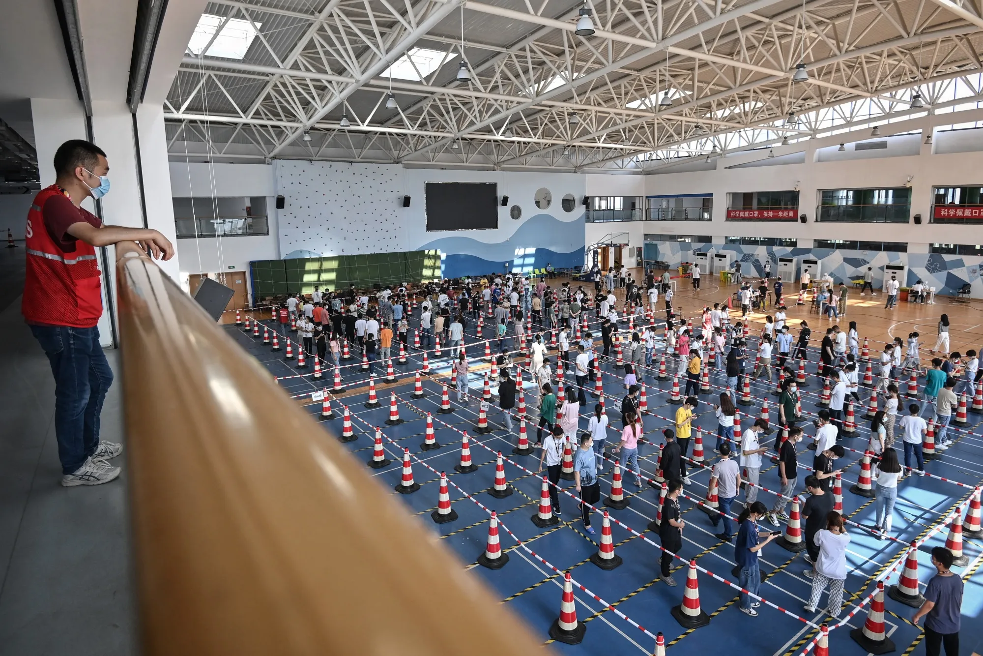 Covid-19 testing at the gym of a company in Wuhan on Aug. 5.
