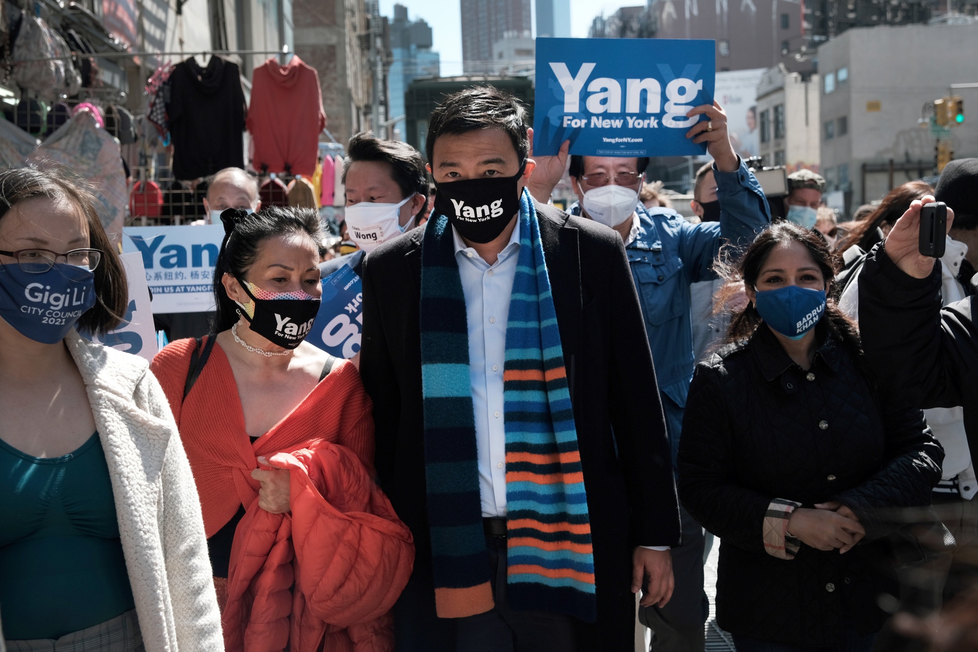 Andrew Yang, center, in Chinatown in New York City on April 5.