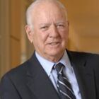 Headshot of Peter J Solomon