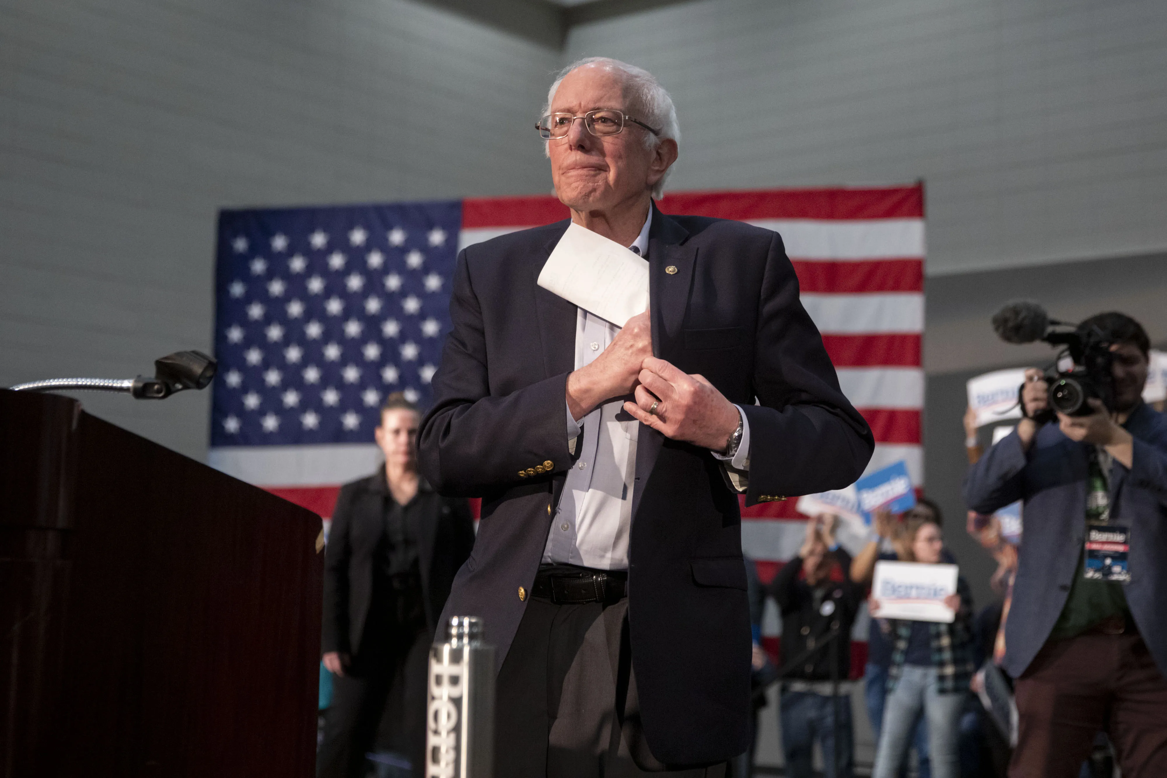 Bernie Sanders places his speech notes in his pocket after speaking at a campaign event in Sioux City, Iowa, on Jan. 26.