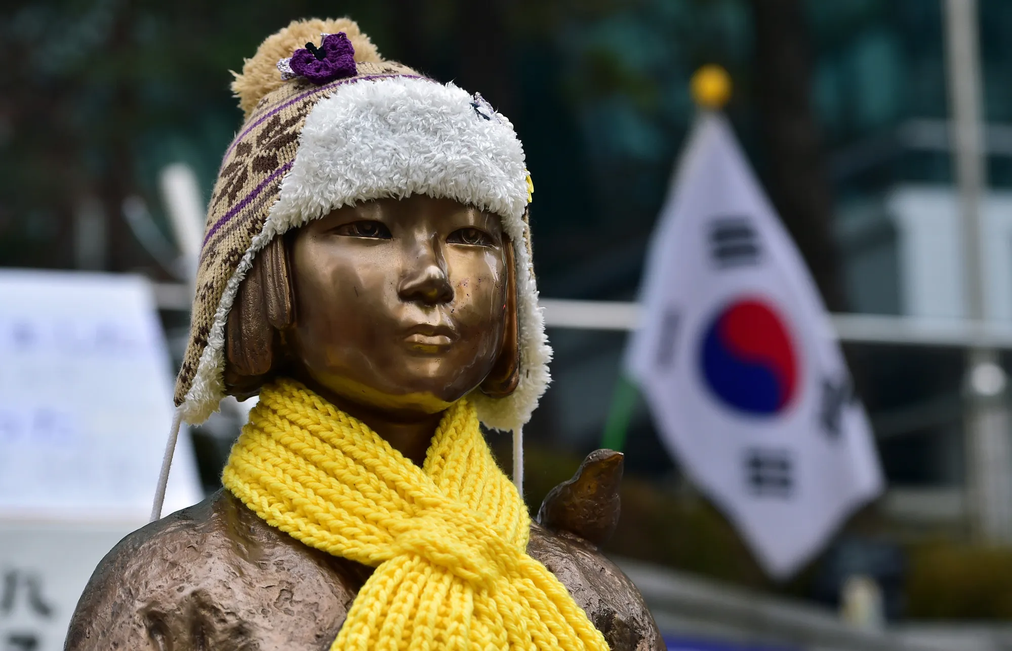 A statue of a teenage girl symbolising former "comfort women" who served as sex slaves for Japanese soldiers during World War II, sits&nbsp;in Seoul.