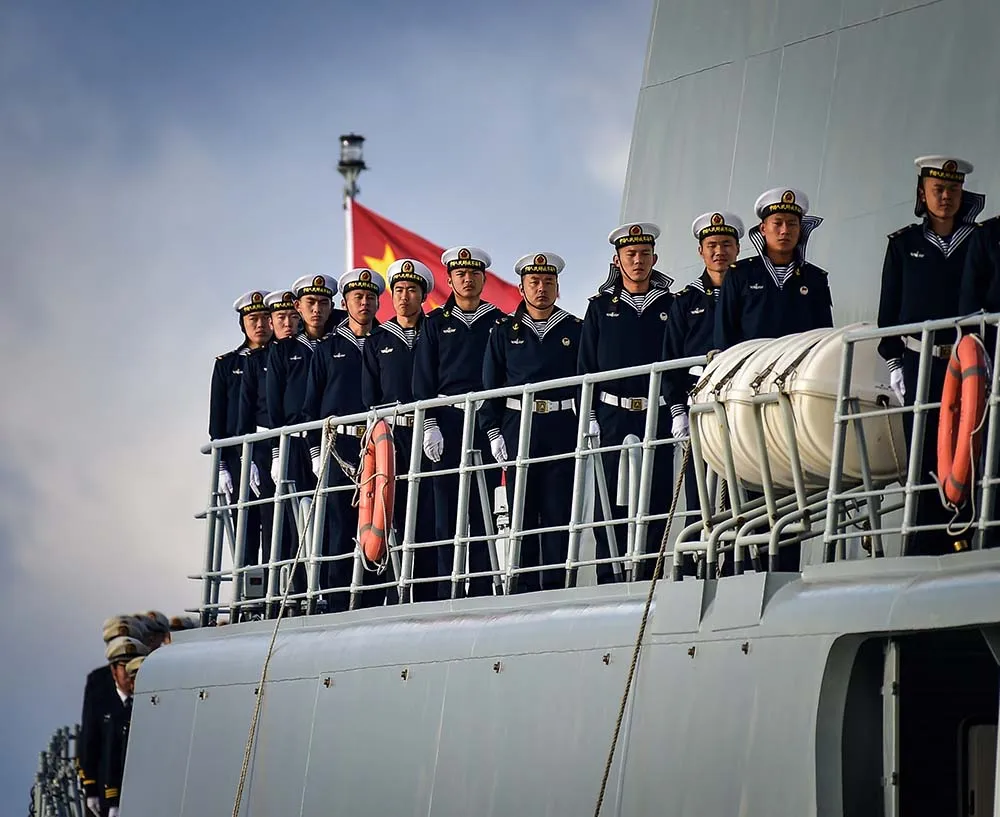 Chinese servicemen at a seeing-off ceremony for Russia's and China's warships taking part in the Naval Cooperation 2017, joint Russian-Chinese military exercise in the Sea of Japan.