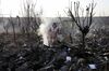 Rescue workers search the scene where an Ukrainian plane crashed in Shahedshahr, southwest of the capital Tehran on Jan. 8, 2020.