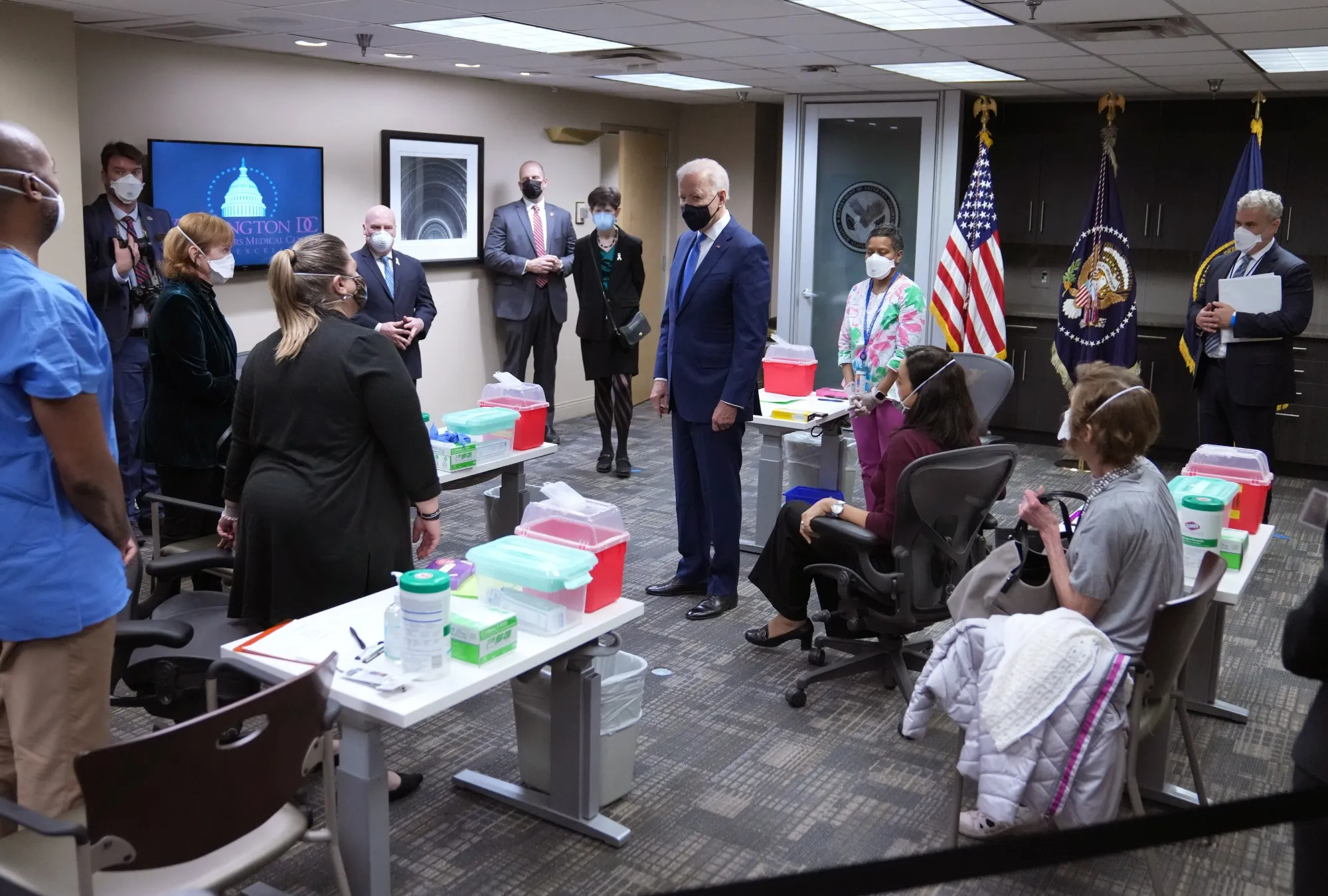President Joe Biden visits a Covid-19 vaccination site in Washington, D.C., in March.