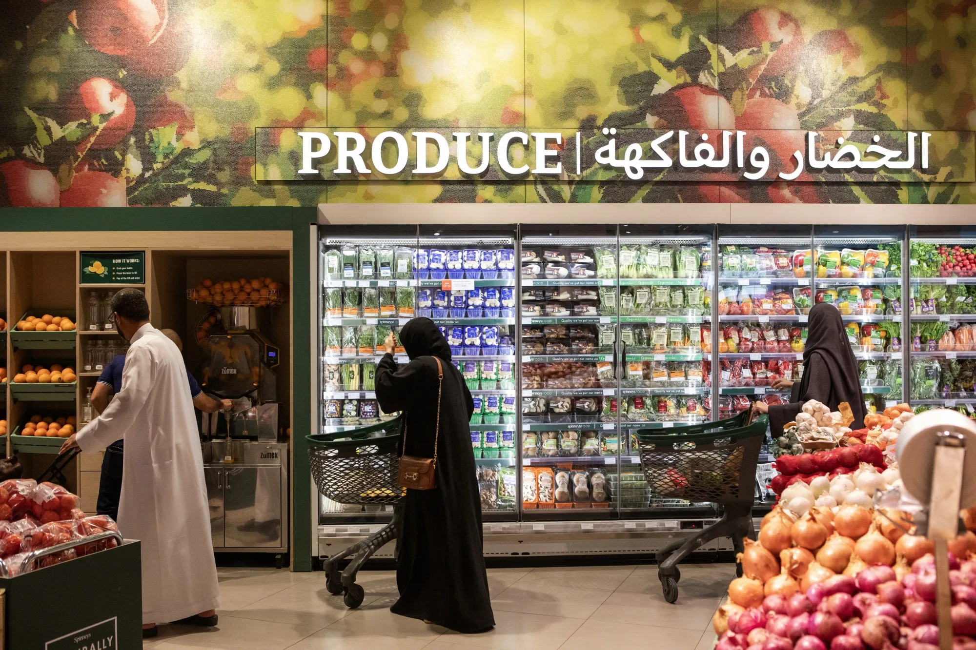Customers shop inside a Spinneys supermarket in Dubai, on&nbsp;May 1.