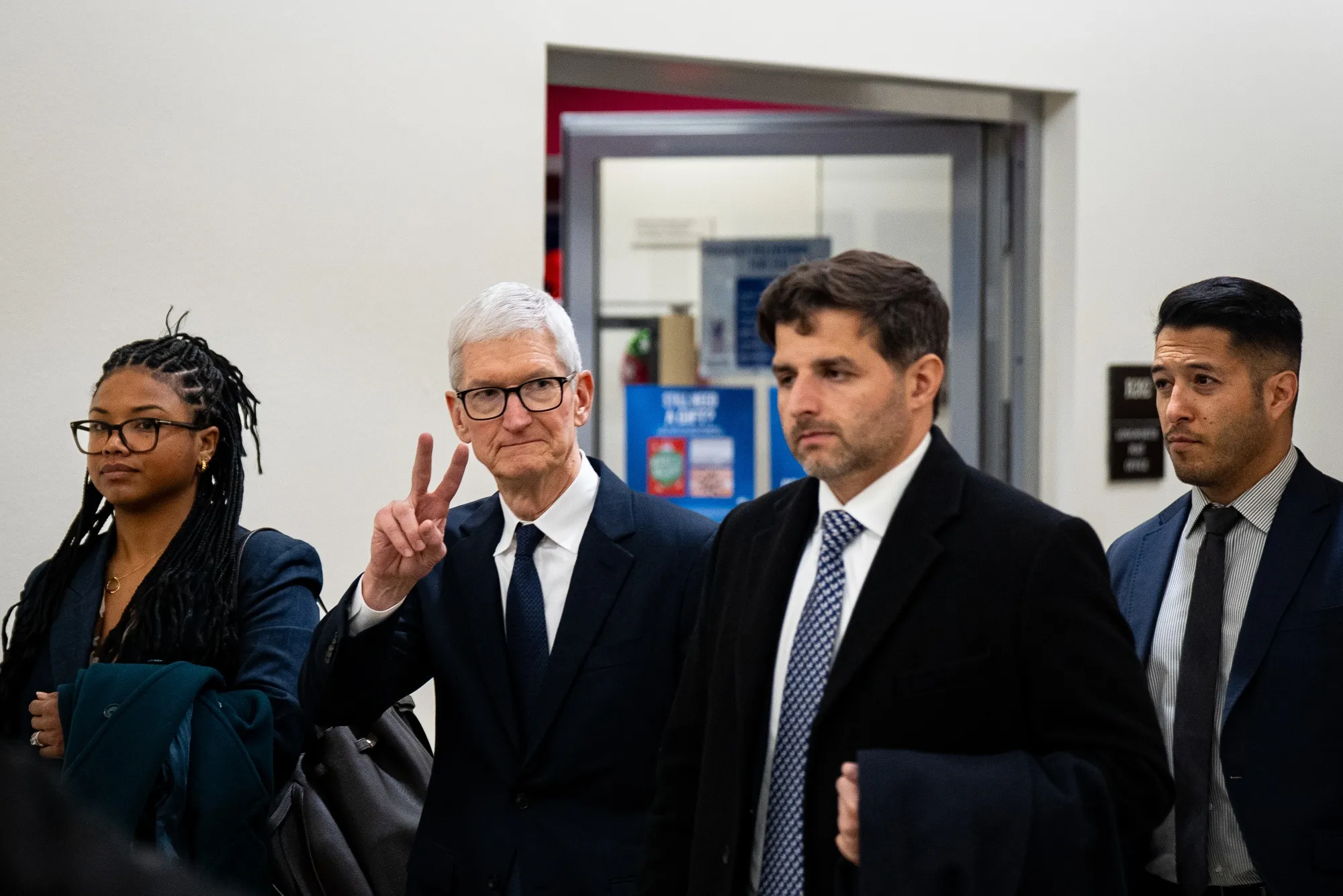 Tim Cook, second left, at the US Capitol on Dec. 10.&nbsp;