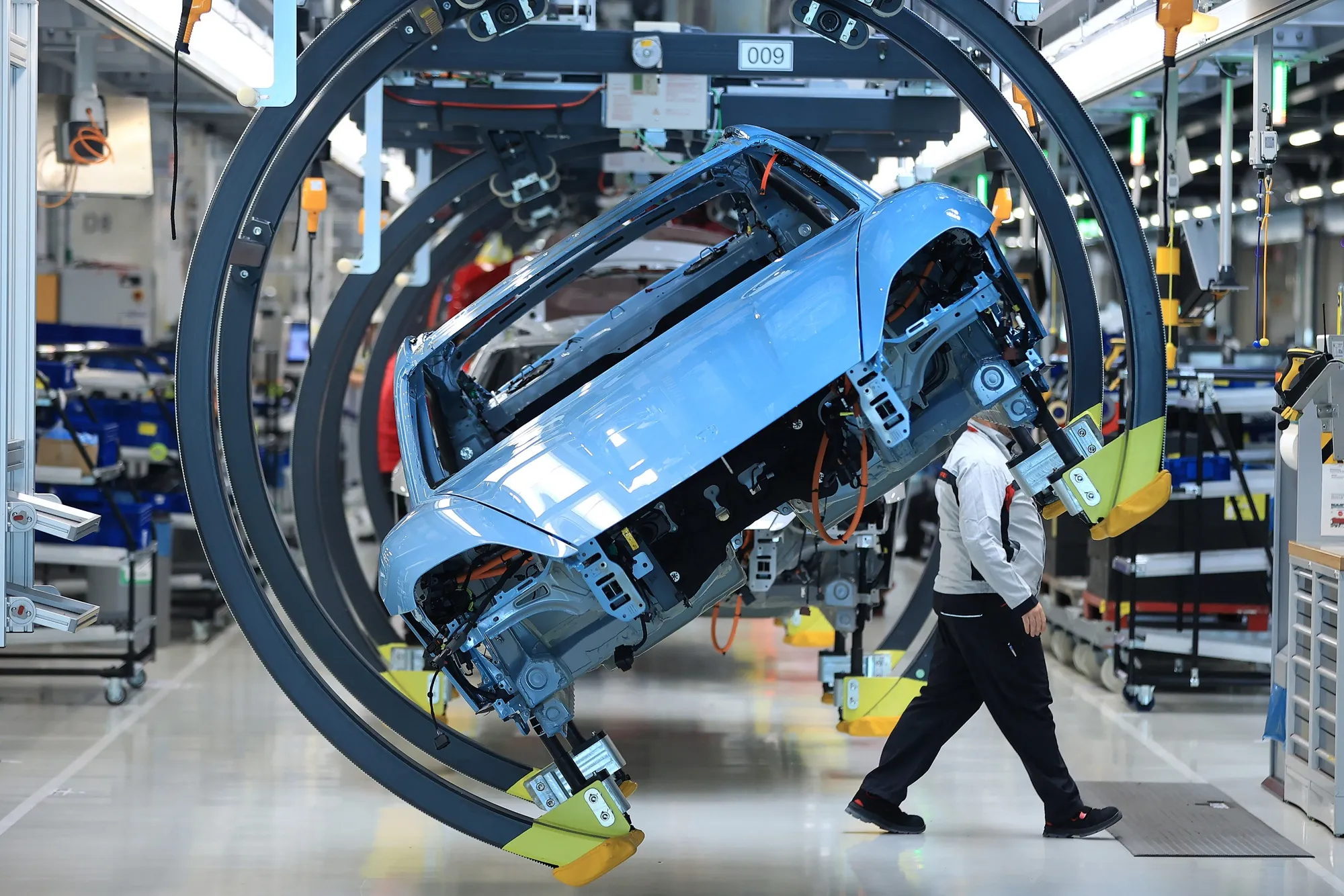 The body shell of an all-electric Porsche Taycan.