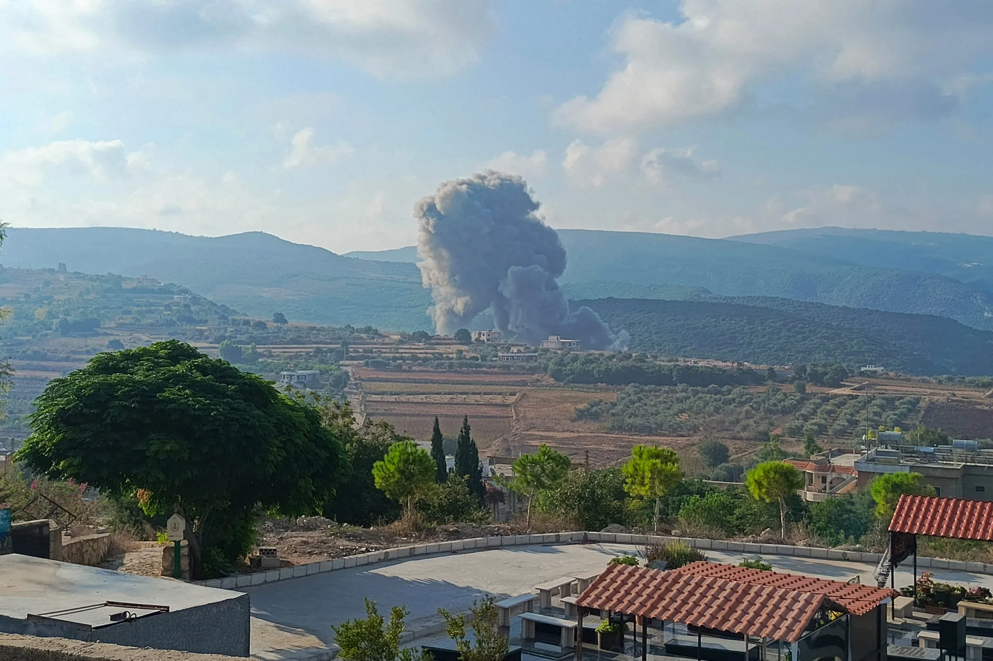 Smoke rises from the site of an airstrike on Zibqin, southern Lebanon, on Aug. 25.