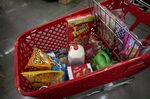 Grocery items in a shopping cart inside a grocery store in San Francisco.