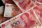 Stocks Boards And Chinese Yuan Banknotes As China Devalues Yuan By Most In Two Decades