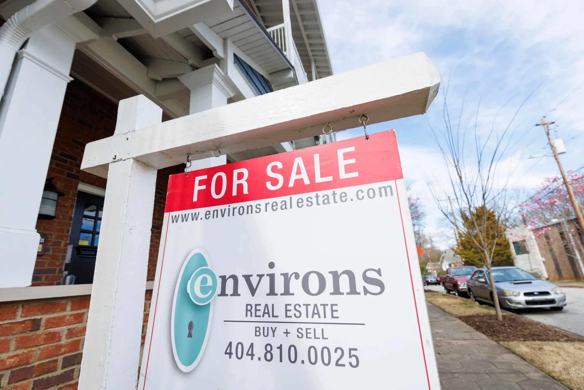 A "For Sale" sign outside of a condo in Atlanta, Georgia.