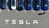 Tesla Reports Quarterly Earnings