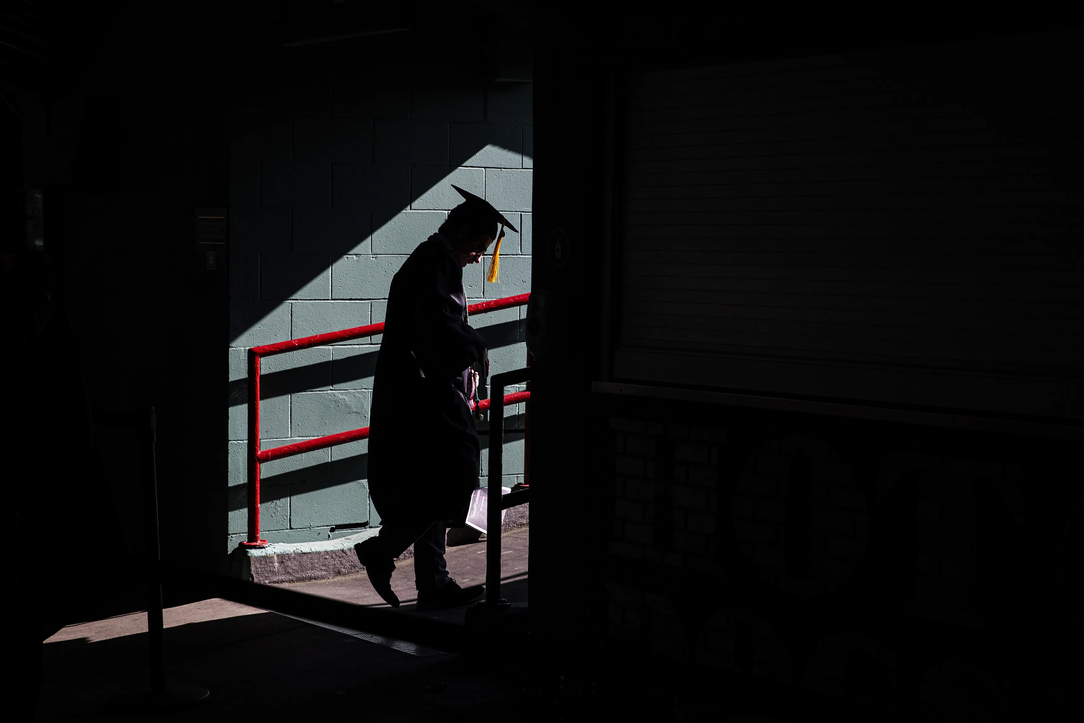 A student arrives for a commencement ceremony in 2022.