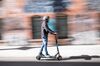 A technician test drives a Skip Transportation Inc. scooter outside company's repair shop in San Francisco, California, U.S.